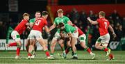 23 February 2024; Hugo McLaughlin of Ireland is tackled during the U20 Six Nations Rugby Championship match between Ireland and Wales at Virgin Media Park in Cork. Photo by Brendan Moran/Sportsfile