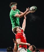 23 February 2024; Joe Hopes of Ireland wins a lineout from Osian Thomas of Wales during the U20 Six Nations Rugby Championship match between Ireland and Wales at Virgin Media Park in Cork. Photo by Brendan Moran/Sportsfile