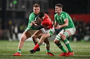 23 February 2024; Harri Wilde of Wales is tackled by Ben Howard and Evan O’Connell of Ireland during the U20 Six Nations Rugby Championship match between Ireland and Wales at Virgin Media Park in Cork. Photo by Brendan Moran/Sportsfile