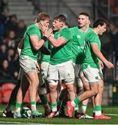 23 February 2024; Hugh Gavin of Ireland celebrates with teammate Bryn Ward after scoring his side's second try during the U20 Six Nations Rugby Championship match between Ireland and Wales at Virgin Media Park in Cork. Photo by Brendan Moran/Sportsfile