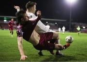23 February 2024; Matthew McKevitt of Cobh Ramblers in action against Dylan Hand of Athlone Town during the SSE Airtricity Men's First Division match between Cobh Ramblers and Athlone Town at Turner's Cross in Cork. Photo by Michael P Ryan/Sportsfile