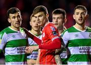 23 February 2024; Sean Gannon of Shelbourne is surrounded by Shamrock Rovers players, from left, Aaron Greene, Markus Poom, Josh Honohan and Lee Grace during the SSE Airtricity Men's Premier Division match between Shelbourne and Shamrock Rovers at Tolka Park in Dublin. Photo by Stephen McCarthy/Sportsfile