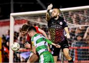 23 February 2024; Shelbourne's Kameron Ledwidge and goalkeeper Conor Kearns in action against Josh Honohan of Shamrock Rovers during the SSE Airtricity Men's Premier Division match between Shelbourne and Shamrock Rovers at Tolka Park in Dublin. Photo by Stephen McCarthy/Sportsfile