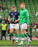 24 February 2024; Jack Crowley, left, and Ciarán Frawley before the Guinness Six Nations Rugby Championship match between Ireland and Wales at Aviva Stadium in Dublin. Photo by Seb Daly/Sportsfile