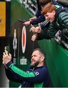 24 February 2024; Ireland head coach Andy Farrell takes a selfie with supporters before the Guinness Six Nations Rugby Championship match between Ireland and Wales at Aviva Stadium in Dublin. Photo by Ramsey Cardy/Sportsfile