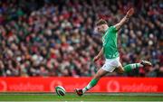 24 February 2024; Jack Crowley of Ireland kicks a penalty during the Guinness Six Nations Rugby Championship match between Ireland and Wales at Aviva Stadium in Dublin. Photo by Seb Daly/Sportsfile
