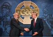 24 February 2024; Uachtarán Chumann Lúthchleas Gael Jarlath Burns, right, shakes hands with Iar-Uachtarán Chumann Lúthchleas Gael Larry McCarthy after becoming Uachtarán during the GAA Congress at Canal Court Hotel in Newry, Down. Photo by Piaras Ó Mídheach/Sportsfile