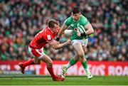 24 February 2024; Calvin Nash of Ireland is tackled by Nick Tompkins of Wales during the Guinness Six Nations Rugby Championship match between Ireland and Wales at Aviva Stadium in Dublin. Photo by Seb Daly/Sportsfile