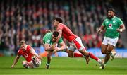 24 February 2024; Dan Sheehan of Ireland is tackled by Sam Costelow and Josh Adams of Wales during the Guinness Six Nations Rugby Championship match between Ireland and Wales at Aviva Stadium in Dublin. Photo by Ramsey Cardy/Sportsfile