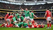 24 February 2024; Joe McCarthy of Ireland celebrates after teammate Dan Sheehan, not pictured, scored their side's first try in the 21st minute, during the Guinness Six Nations Rugby Championship match between Ireland and Wales at Aviva Stadium in Dublin. Photo by Seb Daly/Sportsfile
