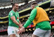 24 February 2024; James Lowe of Ireland celebrates with teammate Stuart McCloskey after scoring their side's second try in the 32nd minute during the Guinness Six Nations Rugby Championship match between Ireland and Wales at Aviva Stadium in Dublin. Photo by Seb Daly/Sportsfile