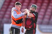24 February 2024; Tyrone goalkeeper Conor McElhatton receives medical attention during the Allianz Hurling League Division 2 Group B match between Tyrone and Donegal at O'Neills Healy Park in Omagh, Tyrone. Photo by Ben McShane/Sportsfile
