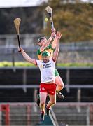 24 February 2024; Gavin Browne of Donegal in action against Aidy Kelly of Tyrone during the Allianz Hurling League Division 2 Group B match between Tyrone and Donegal at O'Neills Healy Park in Omagh, Tyrone. Photo by Ben McShane/Sportsfile