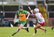 24 February 2024; Conor Gartland of Donegal in action against Ben Gormley of Tyrone during the Allianz Hurling League Division 2 Group B match between Tyrone and Donegal at O'Neills Healy Park in Omagh, Tyrone. Photo by Ben McShane/Sportsfile