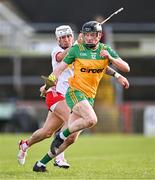 24 February 2024; Conor Gartland of Donegal in action against Ben Gormley of Tyrone during the Allianz Hurling League Division 2 Group B match between Tyrone and Donegal at O'Neills Healy Park in Omagh, Tyrone. Photo by Ben McShane/Sportsfile