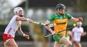 24 February 2024; Conor Gartland of Donegal in action against Ben Gormley of Tyrone during the Allianz Hurling League Division 2 Group B match between Tyrone and Donegal at O'Neills Healy Park in Omagh, Tyrone. Photo by Ben McShane/Sportsfile