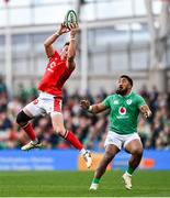 24 February 2024; Josh Adams of Wales in action against Bundee Aki of Ireland during the Guinness Six Nations Rugby Championship match between Ireland and Wales at Aviva Stadium in Dublin. Photo by Ramsey Cardy/Sportsfile