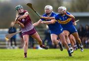 24 February 2024; Niamh Mc Peake of Galway is tackled by Mairéad Eviston, left, and Clodagh McIntyre of Tipperary during the Very Camogie League Division 1 match between Tipperary and Galway at The Ragg GAA Grounds in Tipperary. Photo by Tom Beary/Sportsfile
