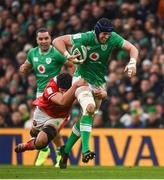 24 February 2024; Ryan Baird of Ireland is tackled by Dafydd Jenkins of Wales during the Guinness Six Nations Rugby Championship match between Ireland and Wales at Aviva Stadium in Dublin. Photo by Sam Barnes/Sportsfile