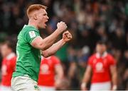 24 February 2024; Ciarán Frawley of Ireland celebrates after scoring his side's third try during the Guinness Six Nations Rugby Championship match between Ireland and Wales at Aviva Stadium in Dublin. Photo by Sam Barnes/Sportsfile