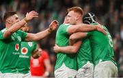 24 February 2024; Ciarán Frawley of Ireland, centre, celebrates with teammates after scoring their side's third try during the Guinness Six Nations Rugby Championship match between Ireland and Wales at Aviva Stadium in Dublin. Photo by Sam Barnes/Sportsfile