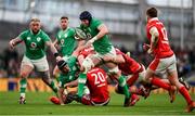 24 February 2024; Ryan Baird of Ireland is tackled by Dafydd Jenkins of Wales during the Guinness Six Nations Rugby Championship match between Ireland and Wales at Aviva Stadium in Dublin. Photo by Ramsey Cardy/Sportsfile