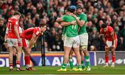 24 February 2024; Tadhg Beirne of Ireland, centre, celebrates with teammates James Lowe and Caelan Doris after scoring their side's fourth try during the Guinness Six Nations Rugby Championship match between Ireland and Wales at Aviva Stadium in Dublin. Photo by Ramsey Cardy/Sportsfile