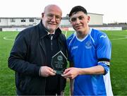 24 February 2024; Sam Conway of Dublin & District Schoolboys League is presented with the Player of the Match award by FAI Director of Competitions Fran Gavin after the FAI Youth Inter League Cup final match between Dublin & District Schoolboys League and Galway Football Association at Athlone Town Stadium in Westmeath. Photo by Tyler Miller/Sportsfile