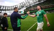 24 February 2024; Ireland head coach Andy Farrell, left, and Caelan Doris celebrate after the Guinness Six Nations Rugby Championship match between Ireland and Wales at Aviva Stadium in Dublin. Photo by Ramsey Cardy/Sportsfile