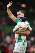 24 February 2024; James Lowe of Ireland, with his son Nico, after his side's victory during the Guinness Six Nations Rugby Championship match between Ireland and Wales at the Aviva Stadium in Dublin. Photo by Seb Daly/Sportsfile