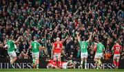 24 February 2024; Ireland supporters celebrate their side's fourth try, scored by Tadhg Beirne, bottom, during the Guinness Six Nations Rugby Championship match between Ireland and Wales at the Aviva Stadium in Dublin. Photo by Seb Daly/Sportsfile