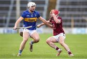24 February 2024; Peter Clarke of Westmeath in action against Cathal Quinn of Tipperary during the Allianz Hurling League Division 1 Group B match between Tipperary and Westmeath at FBD Semple Stadium in Thurles, Tipperary. Photo by Michael P Ryan/Sportsfile