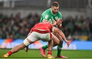 24 February 2024; Stuart McCloskey of Ireland is tackled by Mackenzie Martin of Wales during the Guinness Six Nations Rugby Championship match between Ireland and Wales at Aviva Stadium in Dublin. Photo by Sam Barnes/Sportsfile