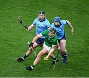 24 February 2024; Darragh O’Donovan of Limerick in action against Seán Gallagher, left, and Conor Burke of Dublin  during the Allianz Hurling League Division 1 Group B match between Dublin and Limerick at Croke Park in Dublin. Photo by Ray McManus/Sportsfile