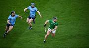 24 February 2024; Darragh O’Donovan of Limerick in action against Seán Gallagher, left, and Conor Burke of Dublin  during the Allianz Hurling League Division 1 Group B match between Dublin and Limerick at Croke Park in Dublin. Photo by Ray McManus/Sportsfile