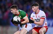24 February 2024; Enda Hession of Mayo in action against Ciarán Daly of Tyrone during the Allianz Football League Division 1 match between Tyrone and Mayo at O'Neills Healy Park in Omagh, Tyrone. Photo by Ben McShane/Sportsfile