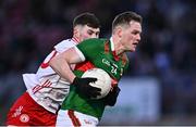 24 February 2024; Matthew Ruane of Mayo in action against Ciarán Daly of Tyrone during the Allianz Football League Division 1 match between Tyrone and Mayo at O'Neills Healy Park in Omagh, Tyrone. Photo by Ben McShane/Sportsfile