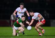 24 February 2024; Darren McHale of Mayo in action against Darren McCurry, right, and Ben Cullen of Tyrone during the Allianz Football League Division 1 match between Tyrone and Mayo at O'Neills Healy Park in Omagh, Tyrone. Photo by Ben McShane/Sportsfile