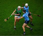 24 February 2024; Kyle Hayes of Limerick is tackled by Danny Sutcliffe, 13, and Darragh Power of Dublin during the Allianz Hurling League Division 1 Group B match between Dublin and Limerick at Croke Park in Dublin. Photo by Ray McManus/Sportsfile