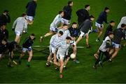 24 February 2024; David Clifford of Kerry, centre, leads his teammates to the warm up before the Allianz Football League Division 1 match between Dublin and Kerry at Croke Park in Dublin. Photo by Ray McManus/Sportsfile