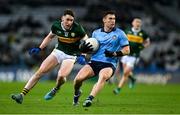 24 February 2024; Lee Gannon of Dublin in action against Cillian Burke of Kerry during the Allianz Football League Division 1 match between Dublin and Kerry at Croke Park in Dublin. Photo by Brendan Moran/Sportsfile