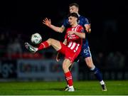 24 February 2024; Simon Power of Sligo Rovers in action against Sam Todd of Derry City during the SSE Airtricity Men's Premier Division match between Sligo Rovers and Derry City at The Showgrounds in Sligo. Photo by Tyler Miller/Sportsfile