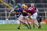 24 February 2024; Brian McGrath of Tipperary in action against Niall Mitchell of Westmeath during the Allianz Hurling League Division 1 Group B match between Tipperary and Westmeath at FBD Semple Stadium in Thurles, Tipperary. Photo by Michael P Ryan/Sportsfile