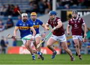 24 February 2024; Kevin Regan of Westmeath in action against Patrick Maher of Tipperary during the Allianz Hurling League Division 1 Group B match between Tipperary and Westmeath at FBD Semple Stadium in Thurles, Tipperary. Photo by Michael P Ryan/Sportsfile