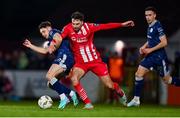 24 February 2024; Adam O'Reilly of Derry City in action against Ellis Chapman of Sligo Rovers during the SSE Airtricity Men's Premier Division match between Sligo Rovers and Derry City at The Showgrounds in Sligo. Photo by Tyler Miller/Sportsfile