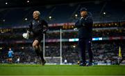 24 February 2024; Dublin manager Dessie Farrell looks on as linesman Fergal Kelly follows the play during the Allianz Football League Division 1 match between Dublin and Kerry at Croke Park in Dublin. Photo by Brendan Moran/Sportsfile