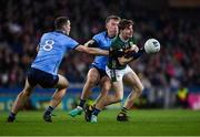 24 February 2024; Keith Evans of Kerry is tackled by Seán Bugler and Brian Fenton of Dublin, 8, during the Allianz Football League Division 1 match between Dublin and Kerry at Croke Park in Dublin. Photo by Shauna Clinton/Sportsfile