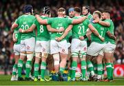 24 February 2024; Ireland players huddle during the Guinness Six Nations Rugby Championship match between Ireland and Wales at the Aviva Stadium in Dublin. Photo by Seb Daly/Sportsfile