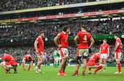 24 February 2024; Wales players react after conceding a fourth try during the Guinness Six Nations Rugby Championship match between Ireland and Wales at Aviva Stadium in Dublin. Photo by Sam Barnes/Sportsfile