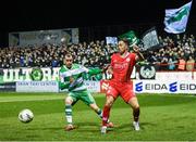 23 February 2024; John O'Sullivan of Shelbourne in action against Sean Kavanagh of Shamrock Rovers during the SSE Airtricity Men's Premier Division match between Shelbourne and Shamrock Rovers at Tolka Park in Dublin. Photo by Stephen McCarthy/Sportsfile